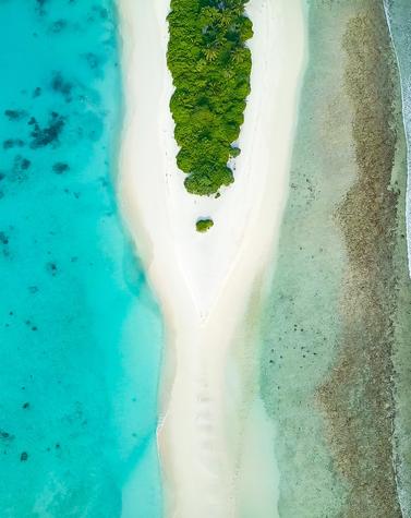 Viajes lujo remoto sostenibilidad islas playas 